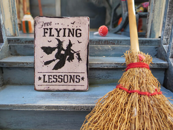 Witch's broomstick in doorway